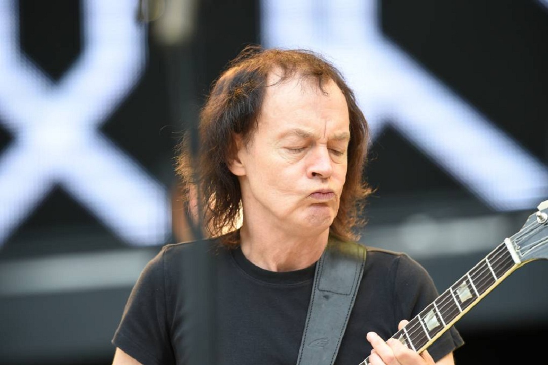 Angus Young Profile, Net Worth, Awards & Top Songs